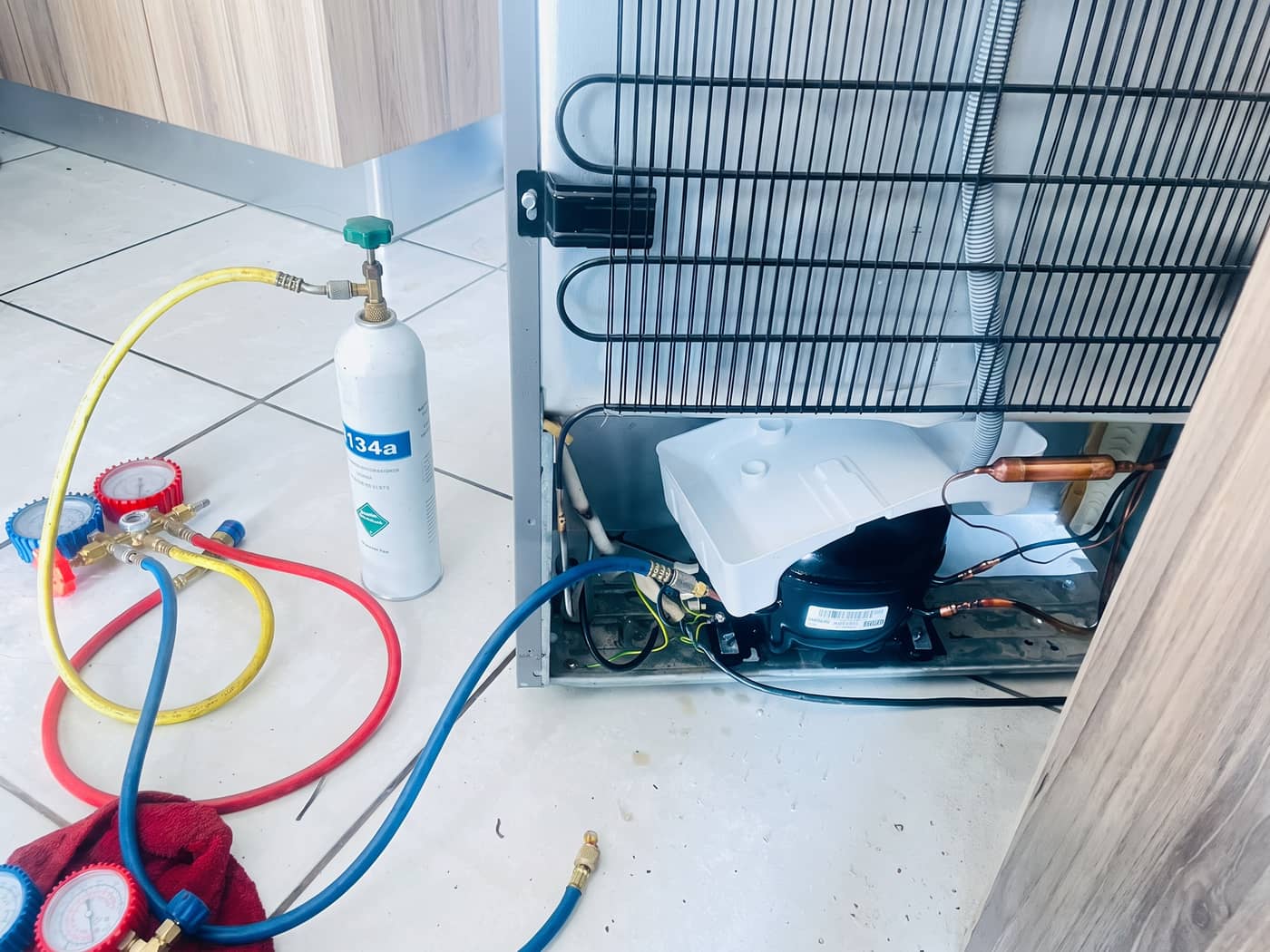Refrigerant gauges connected during a gas regassing job